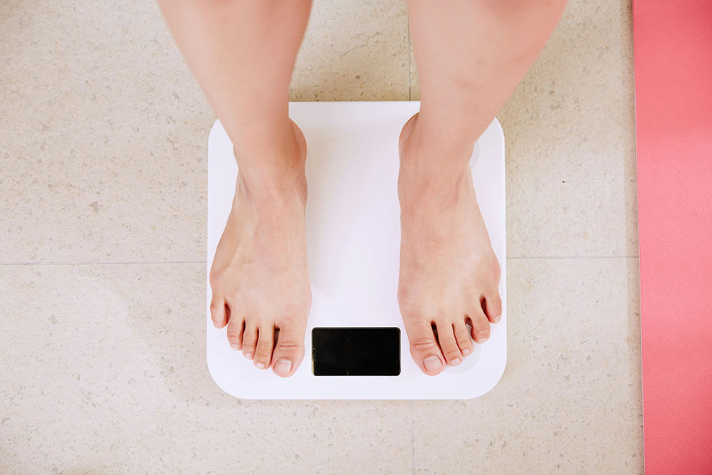 standing on scale